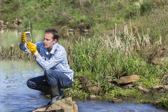 Scientist examining water sample